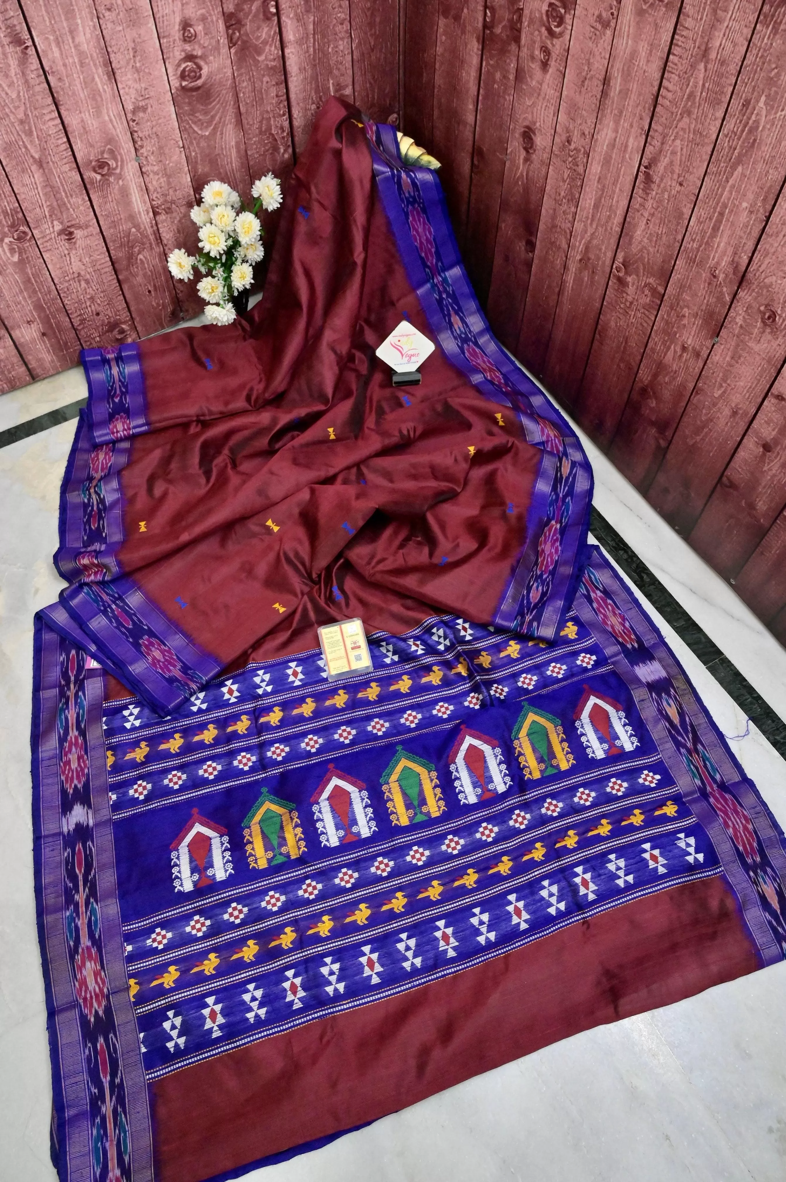 Maroon Color Pure Raw Silk Saree with Dolabedi Pallu and Sambalpuri Border