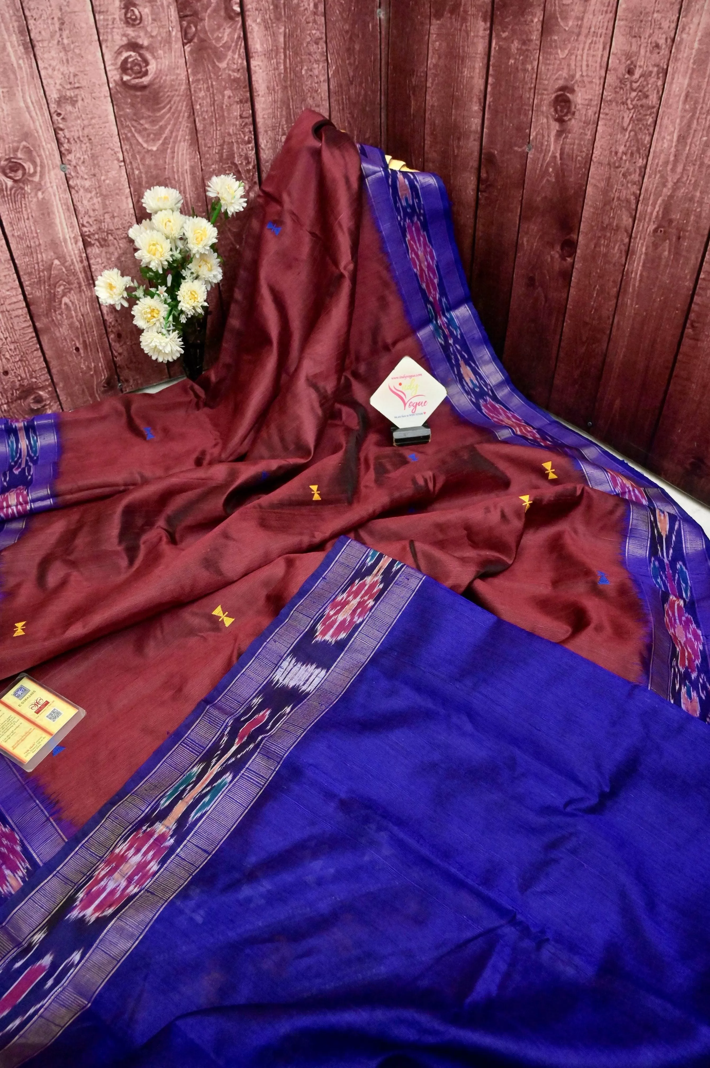 Maroon Color Pure Raw Silk Saree with Dolabedi Pallu and Sambalpuri Border